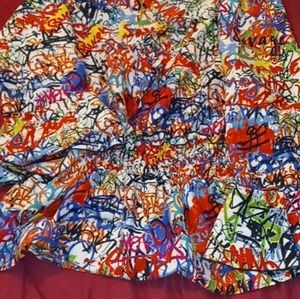 Women's graffiti top with string tied neckline size large